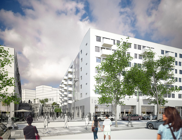 Ett stort vitt flerfamiljshus med några personer i förgrunden.